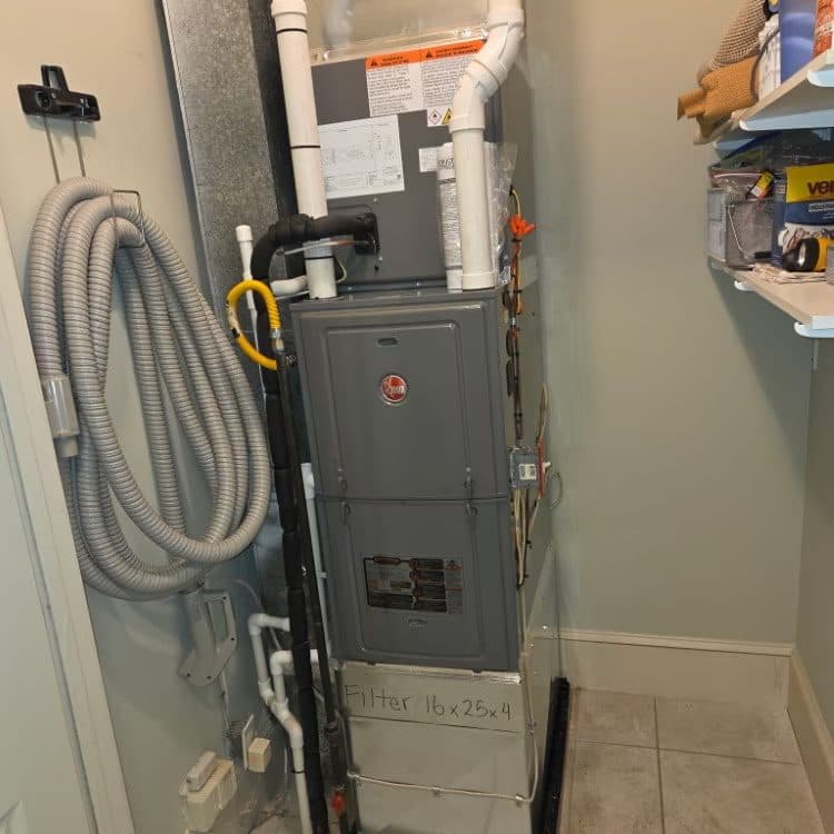 Air handler installed in a tight interior closet with new flexible connector and refrigerant lines