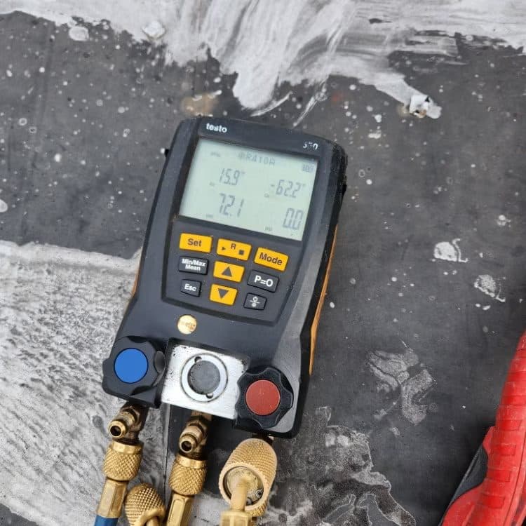 Digital manifold gauge readings during an HVAC system diagnosis